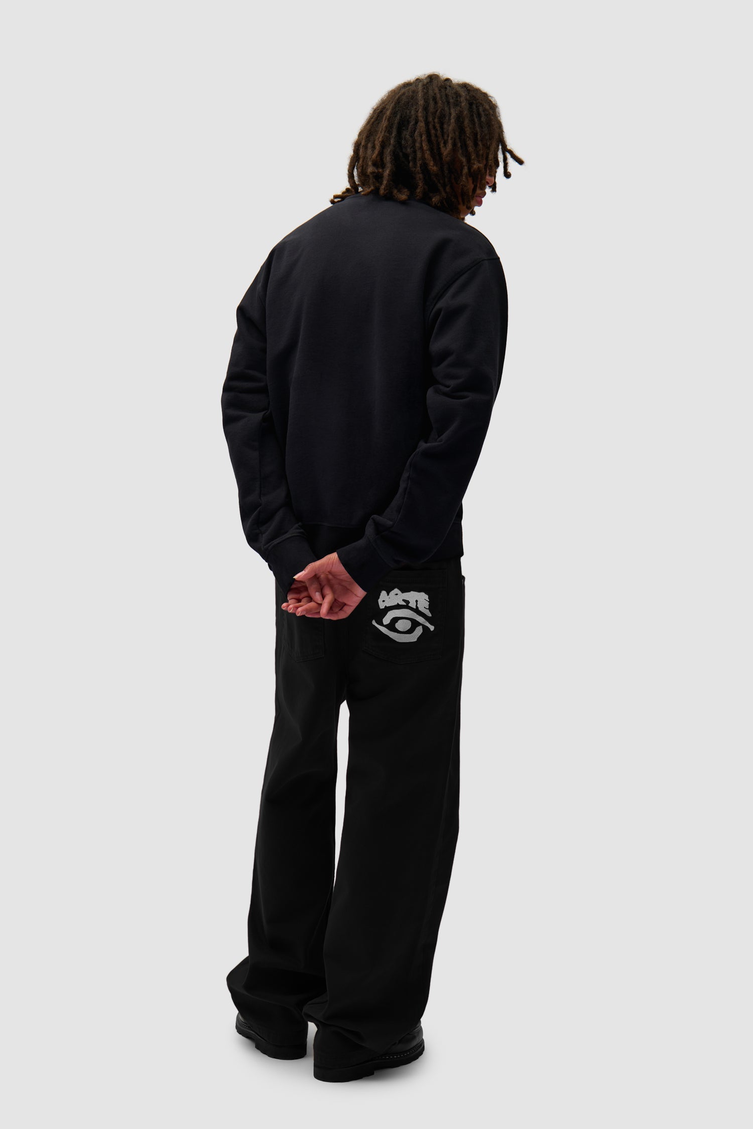 Pantalon graphique à poche arrière - Noir