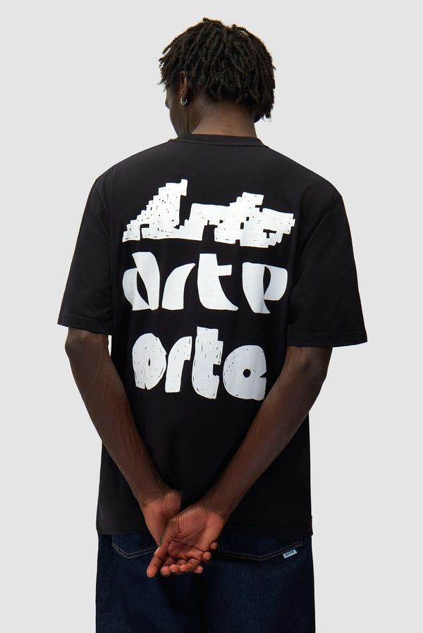 Multi Arte Print T-Shirt in Black worn by a model, half-body back view