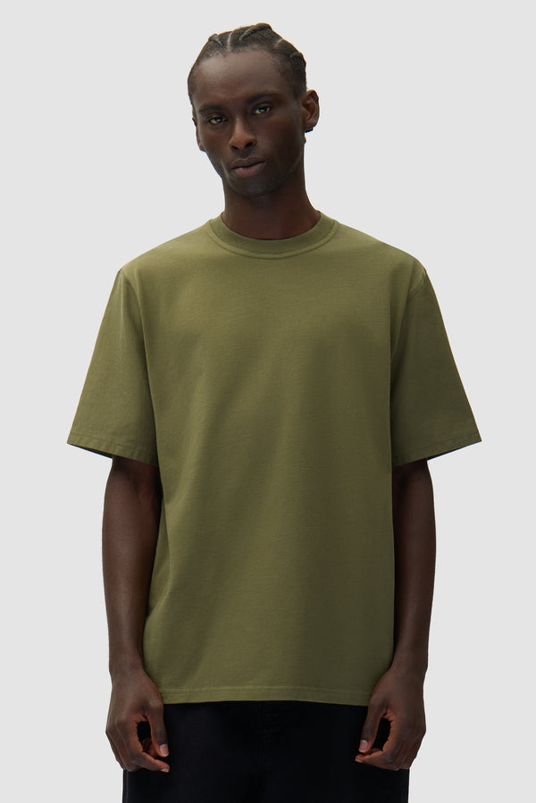 Diels Scribble T-shirt in Green worn by a model, half-body front view