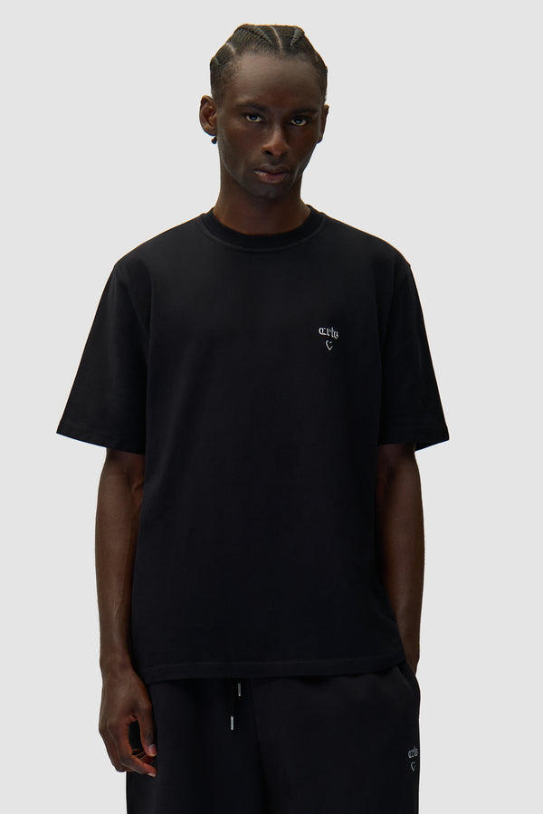 Arte Heart T-shirt in Black worn by a model, half-body front view