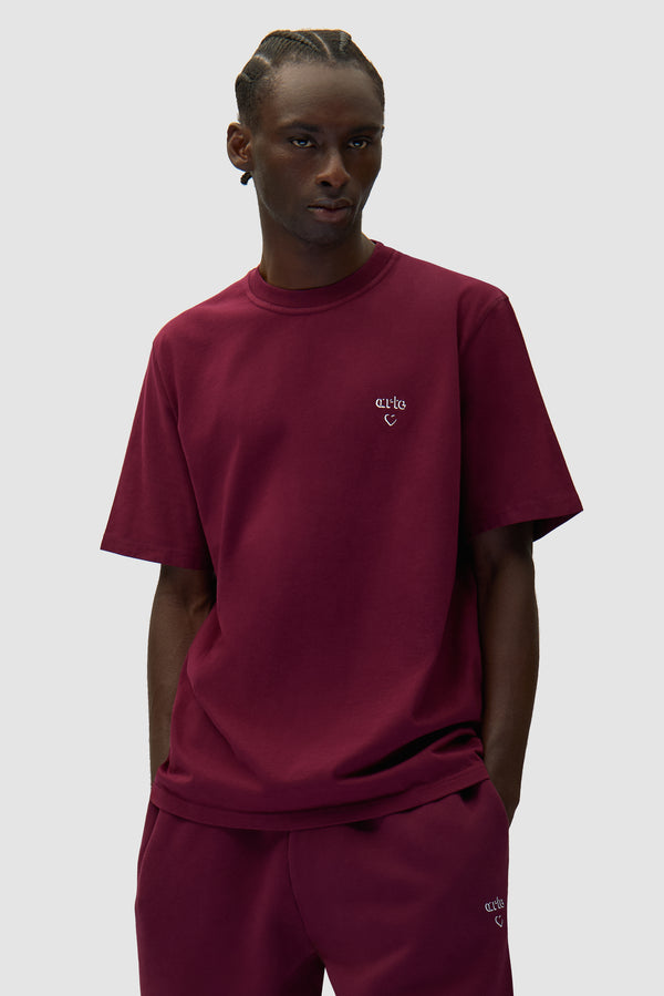 Arte Heart T-shirt in Bordeaux worn by a model, half-body front view