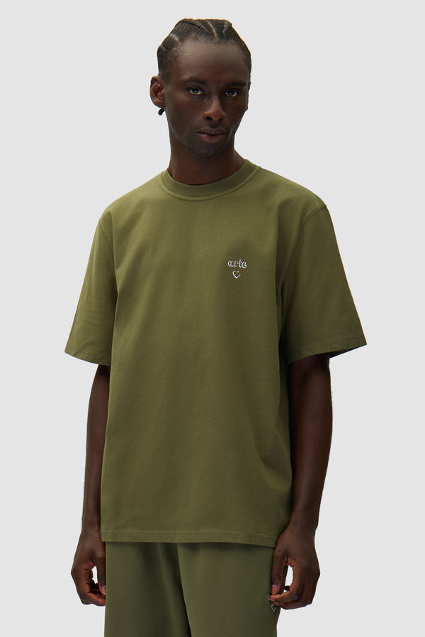 Arte Heart T-shirt in Green worn by a model, half-body front view