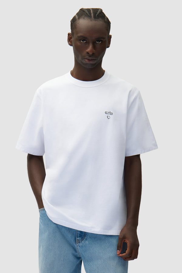 Arte Heart T-shirt in White worn by a model, half-body front view