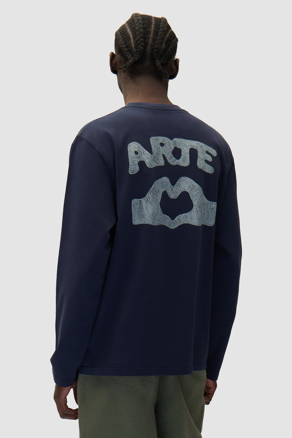 Diels Scribble Longsleeve in Navy worn by a model, half-body back view