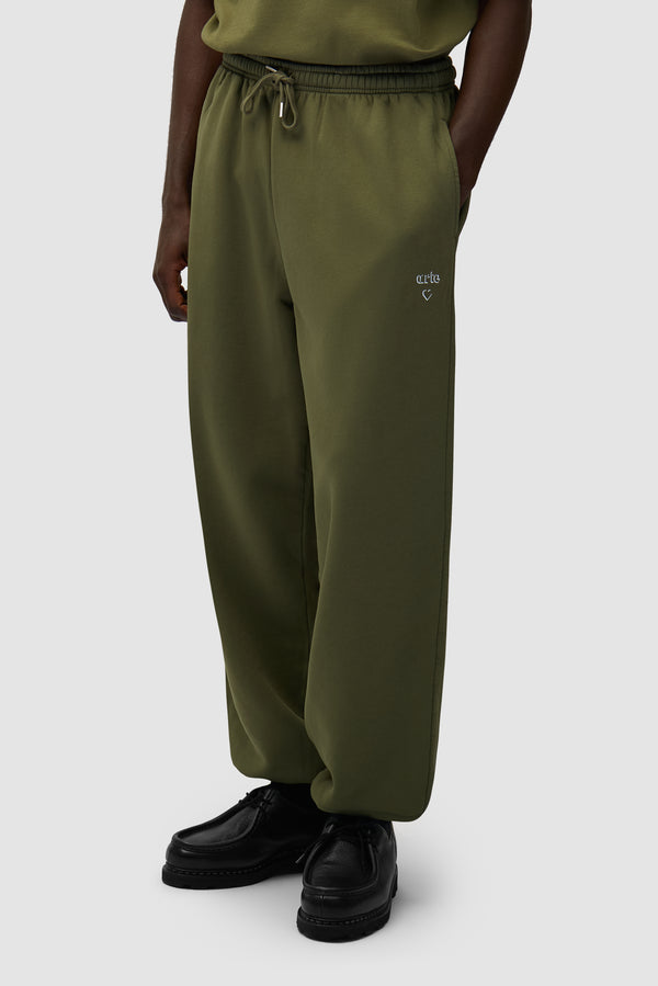 Arte Heart Pants in Green worn by a model, half-body front view