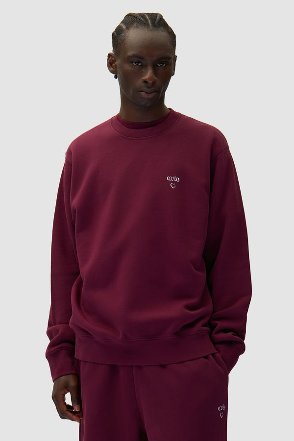 Arte Heart Crewneck in Bordeaux worn by a model, half-body front view