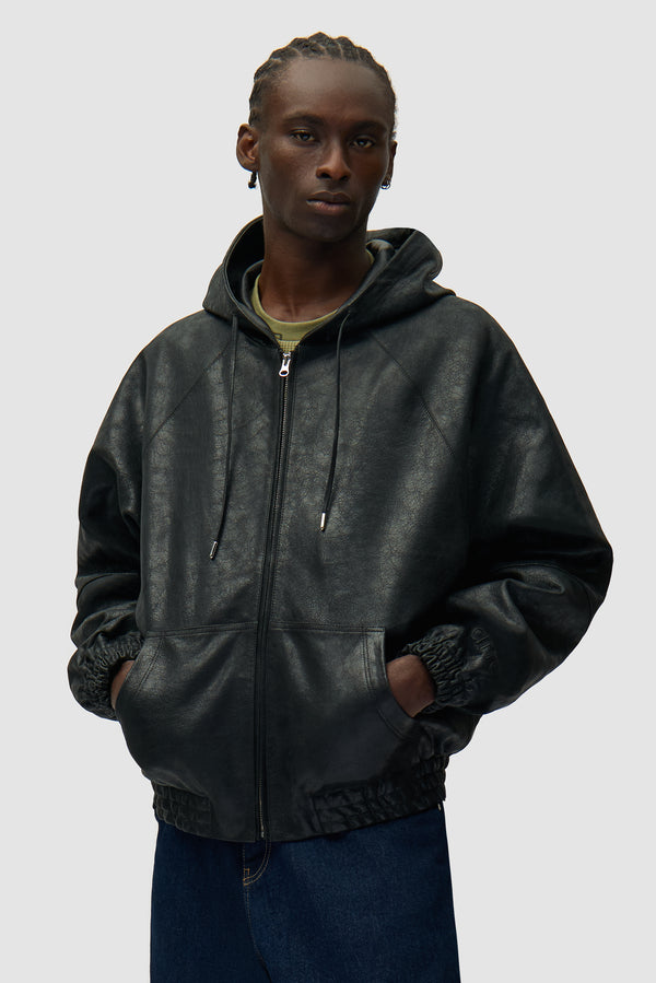 Cracked Leather Jacket in Black worn by a model, half-body front view