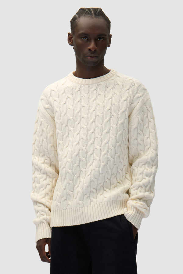 Arte Knit Sweater in Cream worn by a model, half-body front view