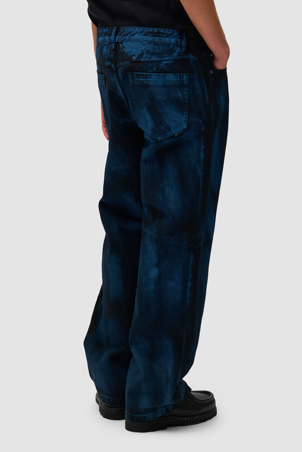 Paint Pants in Black worn by a model, half-body back view