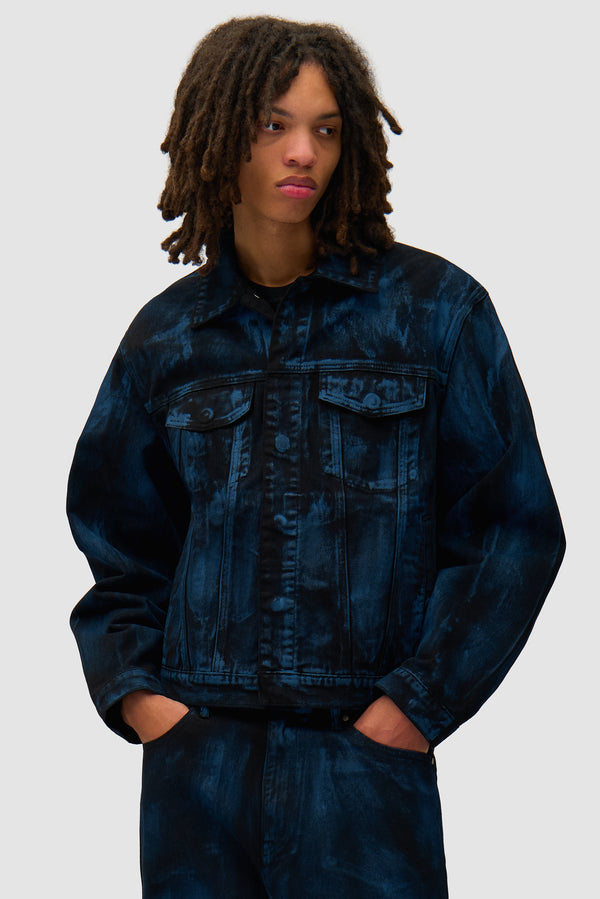 Paint Jacket in Black worn by a model, half-body front view