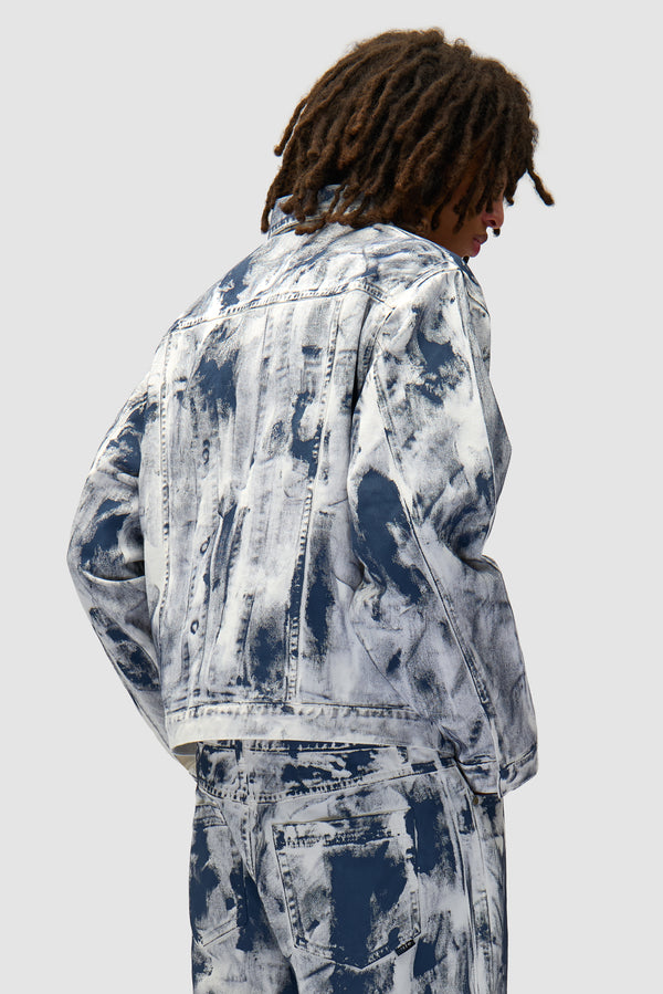 Paint Jacket in White worn by a model, half-body back view