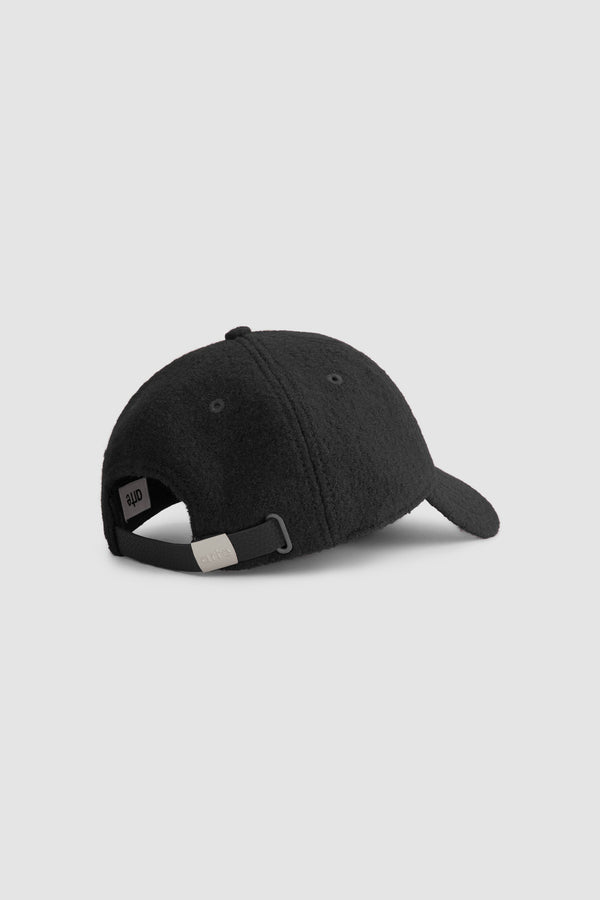 Boiled Wool Cap in Black, back view