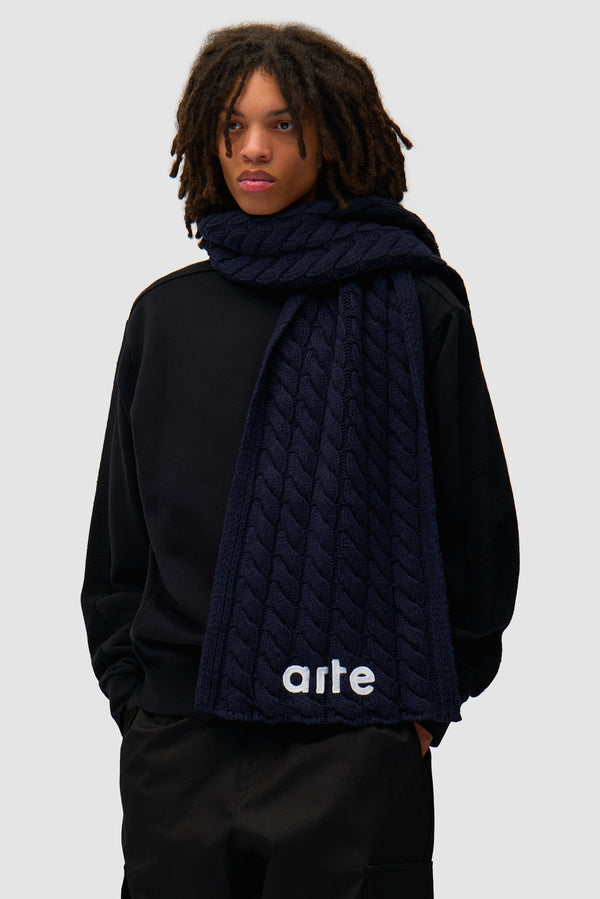 Textured Logo Scarf in Blue worn by a model, half-body front view