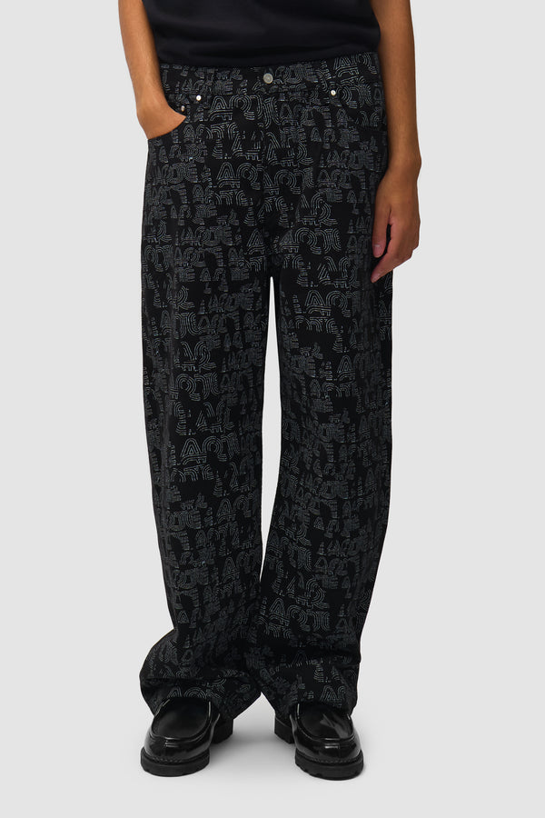 Allover Arte Pants in Black worn by a model, half-body front view