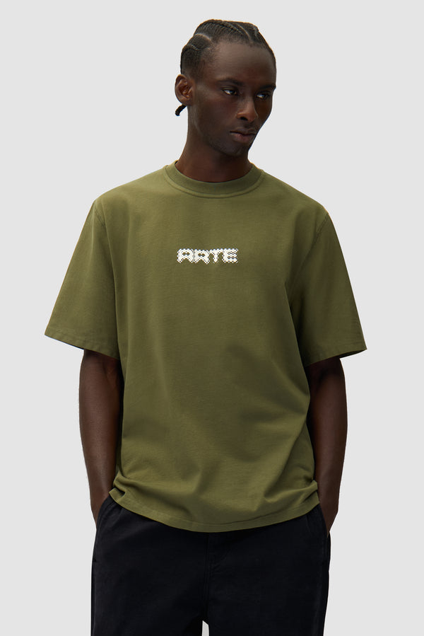 Arte Pixel T-shirt in Green worn by a model, half-body front view