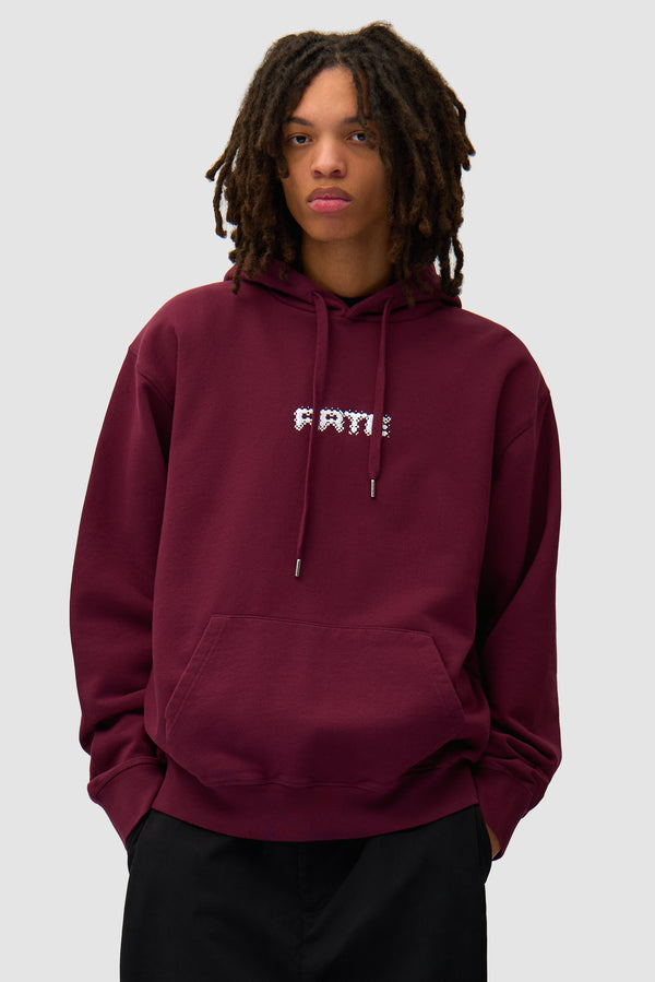 Arte Pixel Hoodie in Bordeaux worn by a model, half-body front view