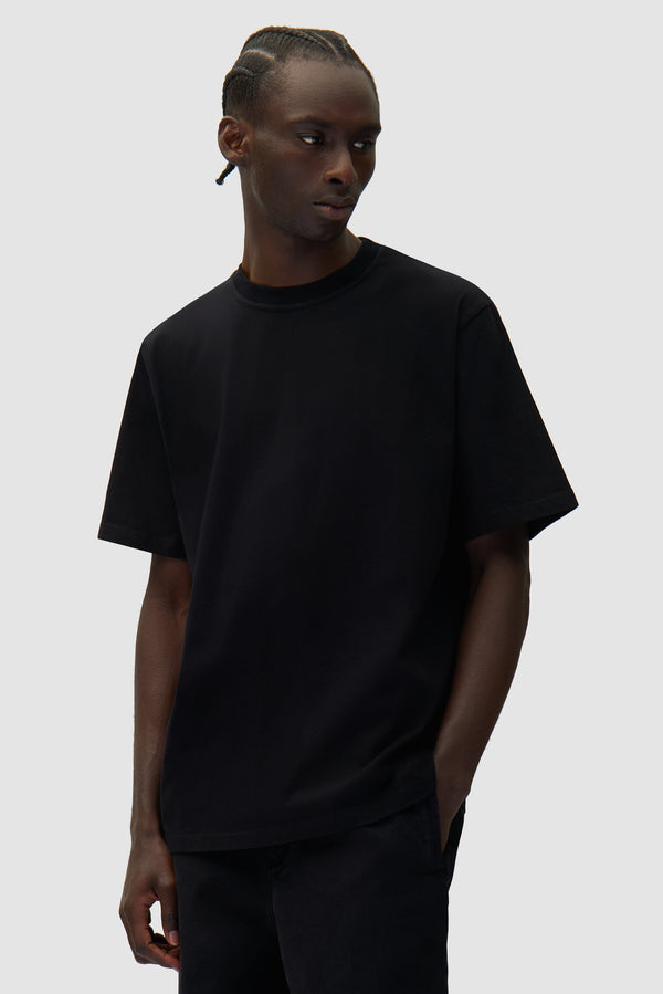 Pixel Back T-shirt in Black worn by a model, half-body front view
