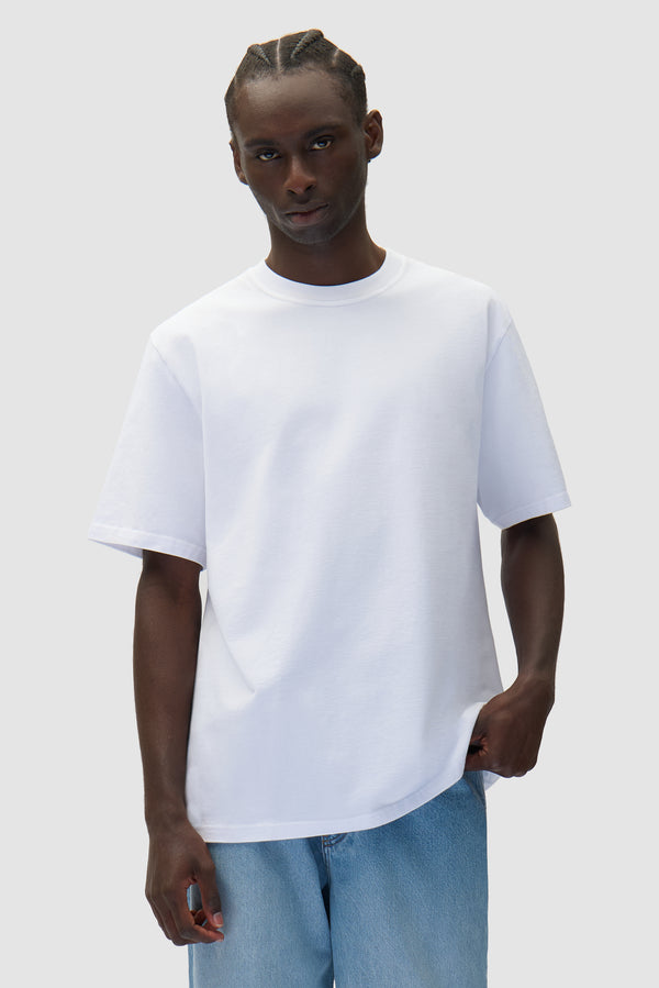 Pixel Back T-shirt in White worn by a model, half-body front view