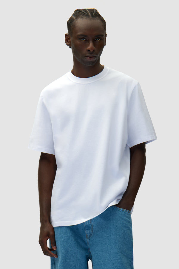 Eye Print T-shirt in White worn by a model, half-body front view