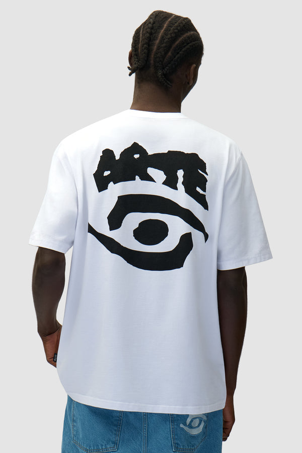 Eye Print T-shirt in White worn by a model, half-body back view