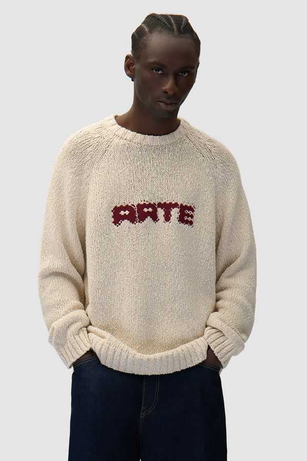 Pixel Front Knit in Cream worn by a model, half-body front view