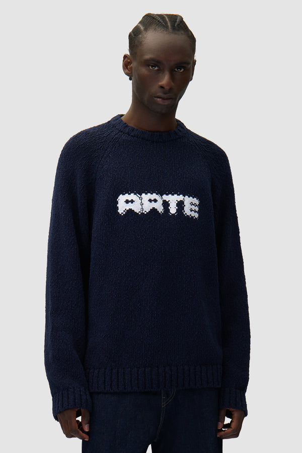 Pixel Front Knit in Navy worn by a model, half-body front view