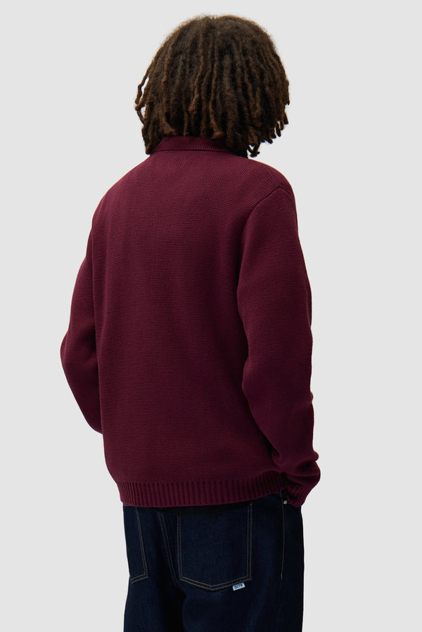 All Together Cardigan in Bordeaux worn by a model, half-body back view