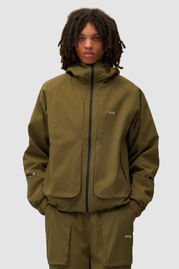 Technical Polar Jacket in Green worn by a model, half-body front view