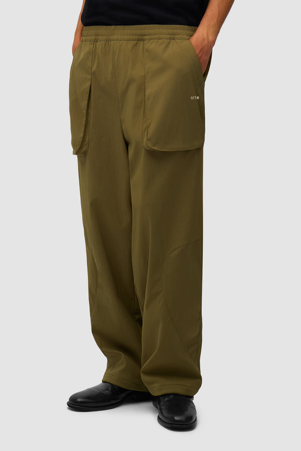 Technical Polar Pants in Green worn by a model, half-body front view