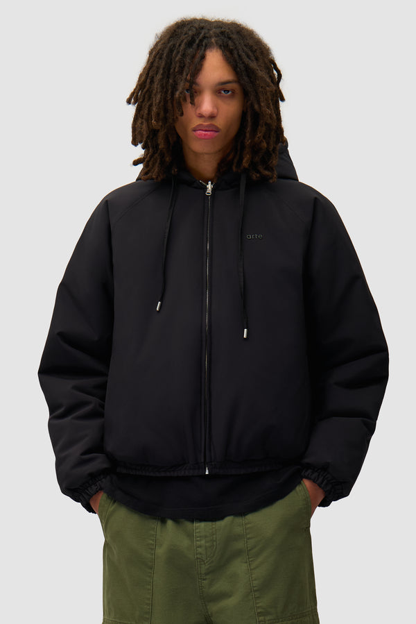 Nylon Reversible Jacket in Black worn by a model, half-body front view