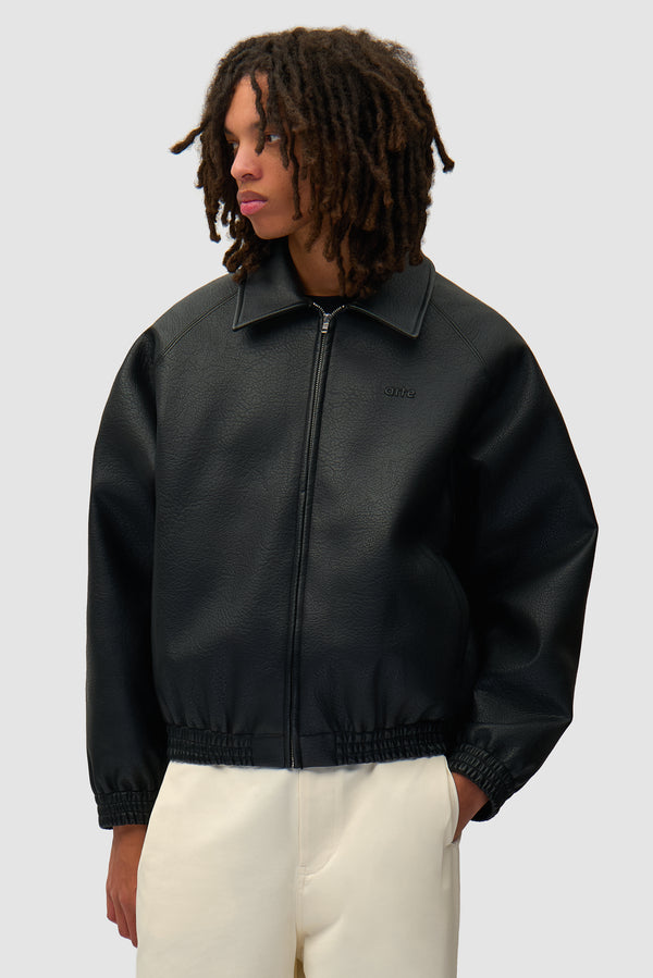 Basic Leather Jacket in Black worn by a model, half-body front view