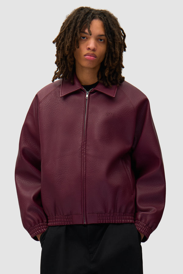 Basic Leather Jacket in Bordeaux worn by a model, half-body front view