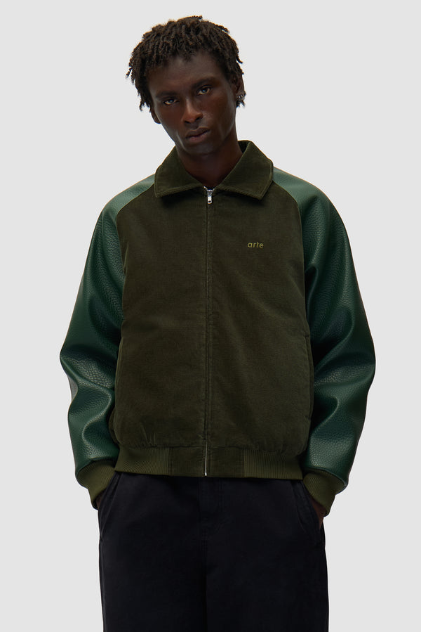 Varsity Jacket in Green worn by a model, half-body front view