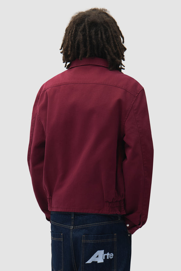 Classic Jacket in Bordeaux worn by a model, full-body side view