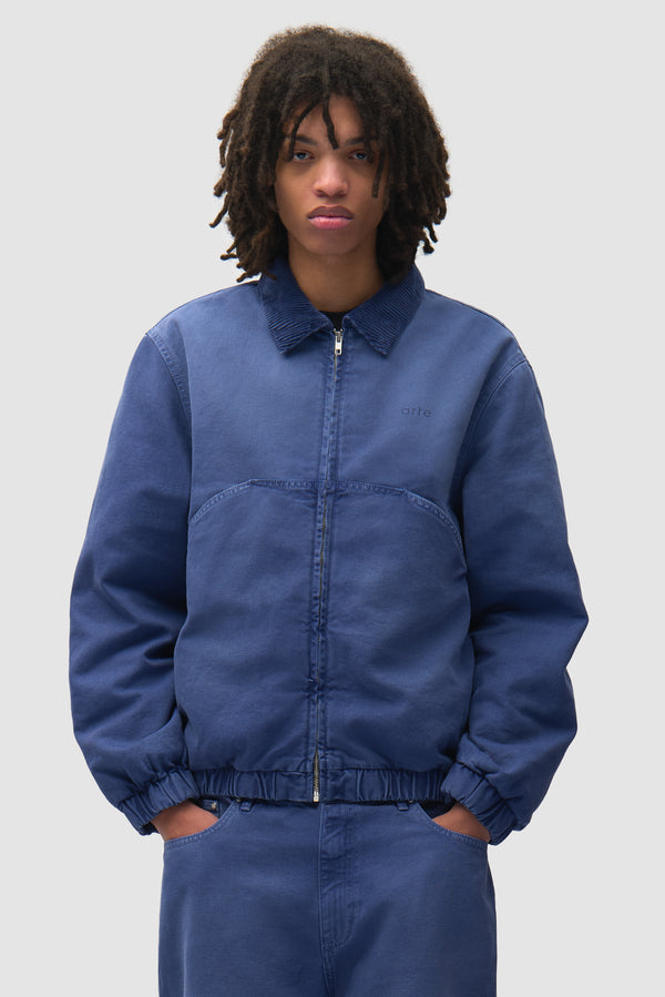 Arc Denim Jacket in Blue worn by a model, half-body front view