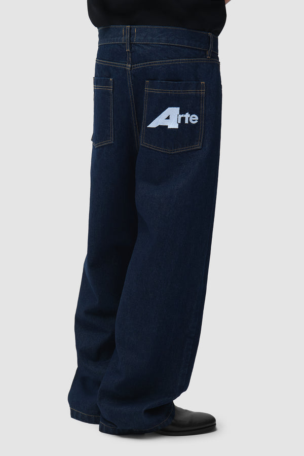 Big A Uniform Denim Pants in Denim worn by a model, half-body back view