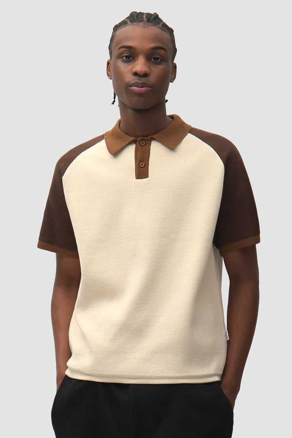 Knit Polo in Brown/Cream worn by a model, half-body front view