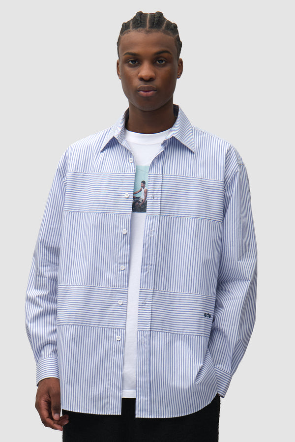 Striped Gallery Shirt in Blue worn by a model, half-body front view