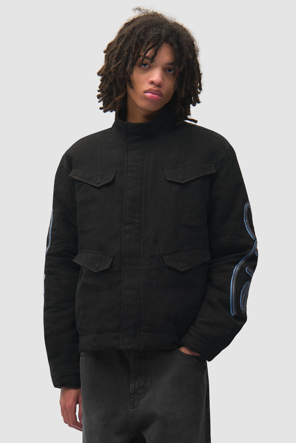 Swirl Utility Jacket in Black worn by a model, half-body front view