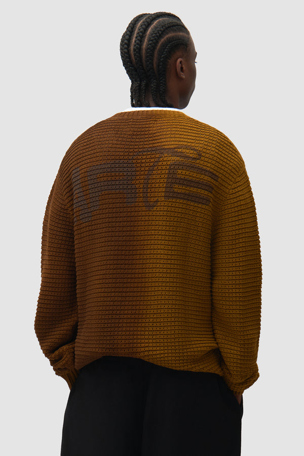 Polyform Sunfade Knit in Brown worn by a model, full-body front view