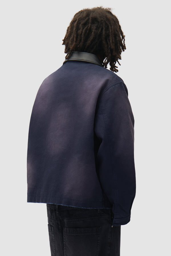 Sunfade Atelier Jacket in Navy worn by a model, half-body back view