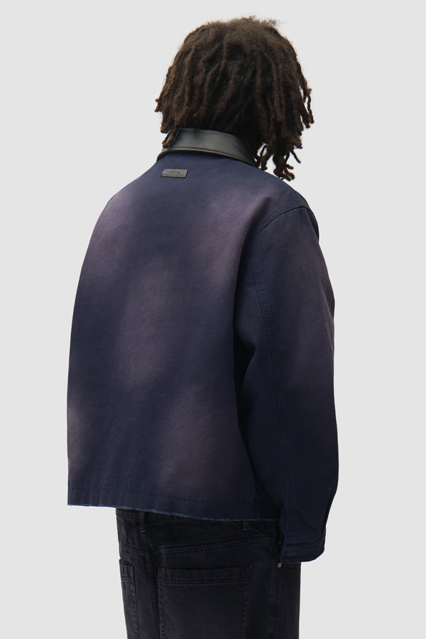 Sunfade Atelier Jacket in Navy worn by a model, half-body back view