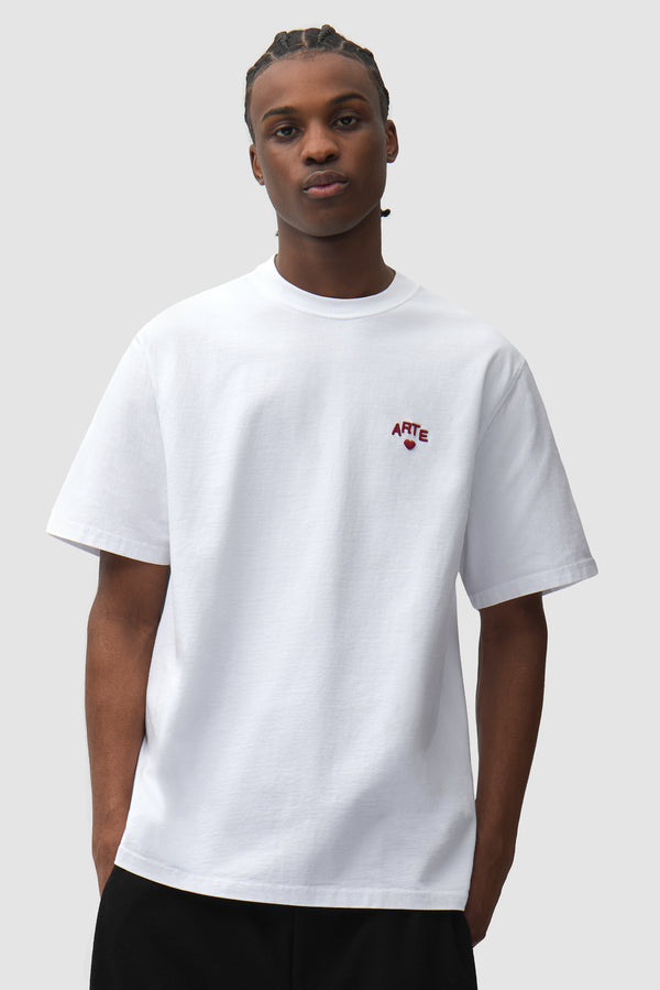 Cor T-shirt in White worn by a model, half-body front view