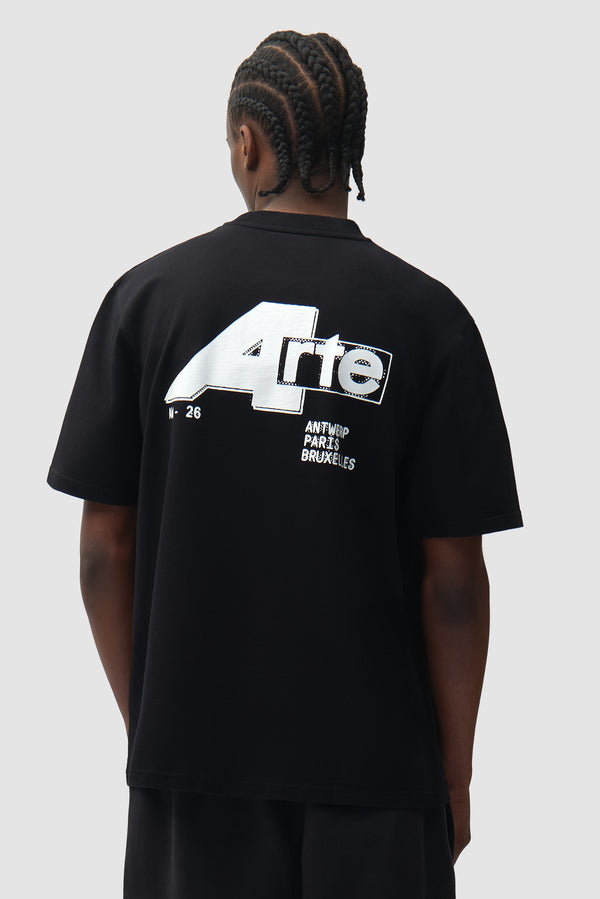 Big A T-shirt in Black worn by a model, half-body back view