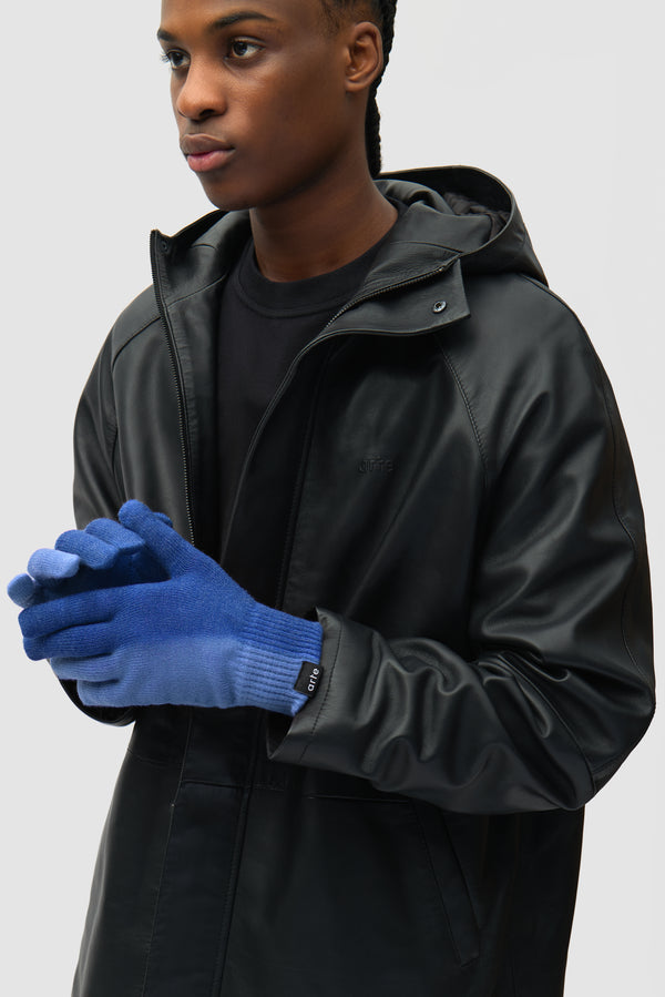 Sunfade Knit Gloves in Black worn by a model, half-body front view