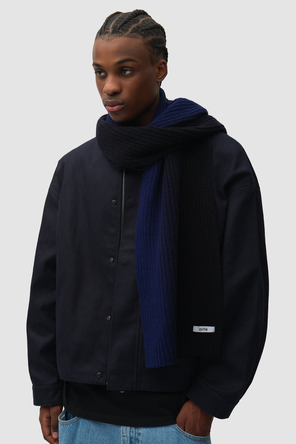 Sunfade Scarf in Navy worn by a model, half-body front view