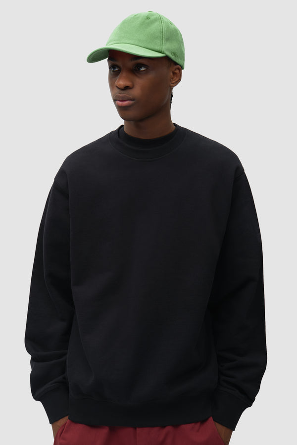 Sunfade Cap in Green worn by a model, half-body front view