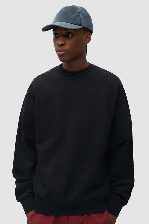 Sunfade Cap in Navy worn by a model, half-body front view