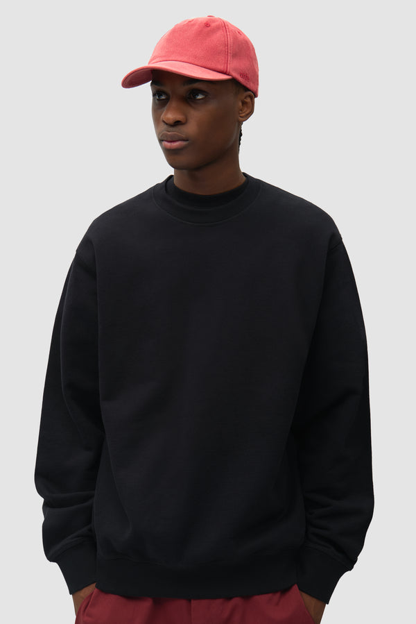 Sunfade Cap in Red worn by a model, half-body front view