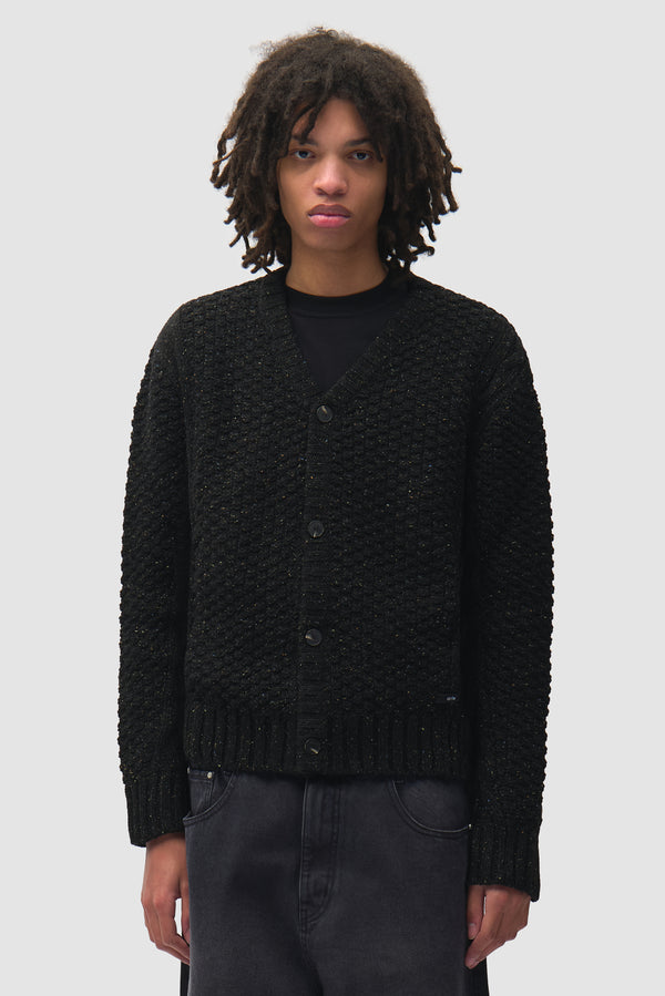 Speckle Cable Knit Cardigan in Black worn by a model, half-body front view